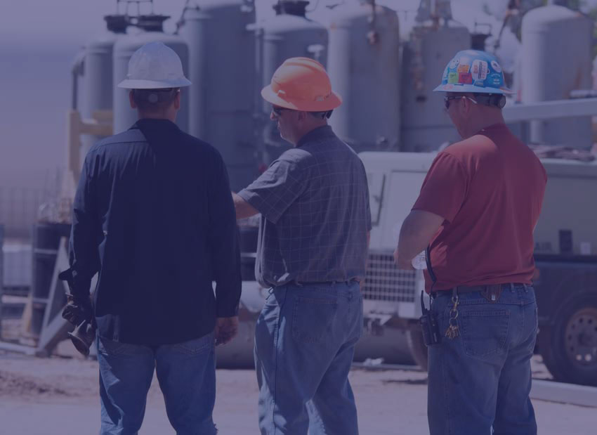 Construction workers on industrial site